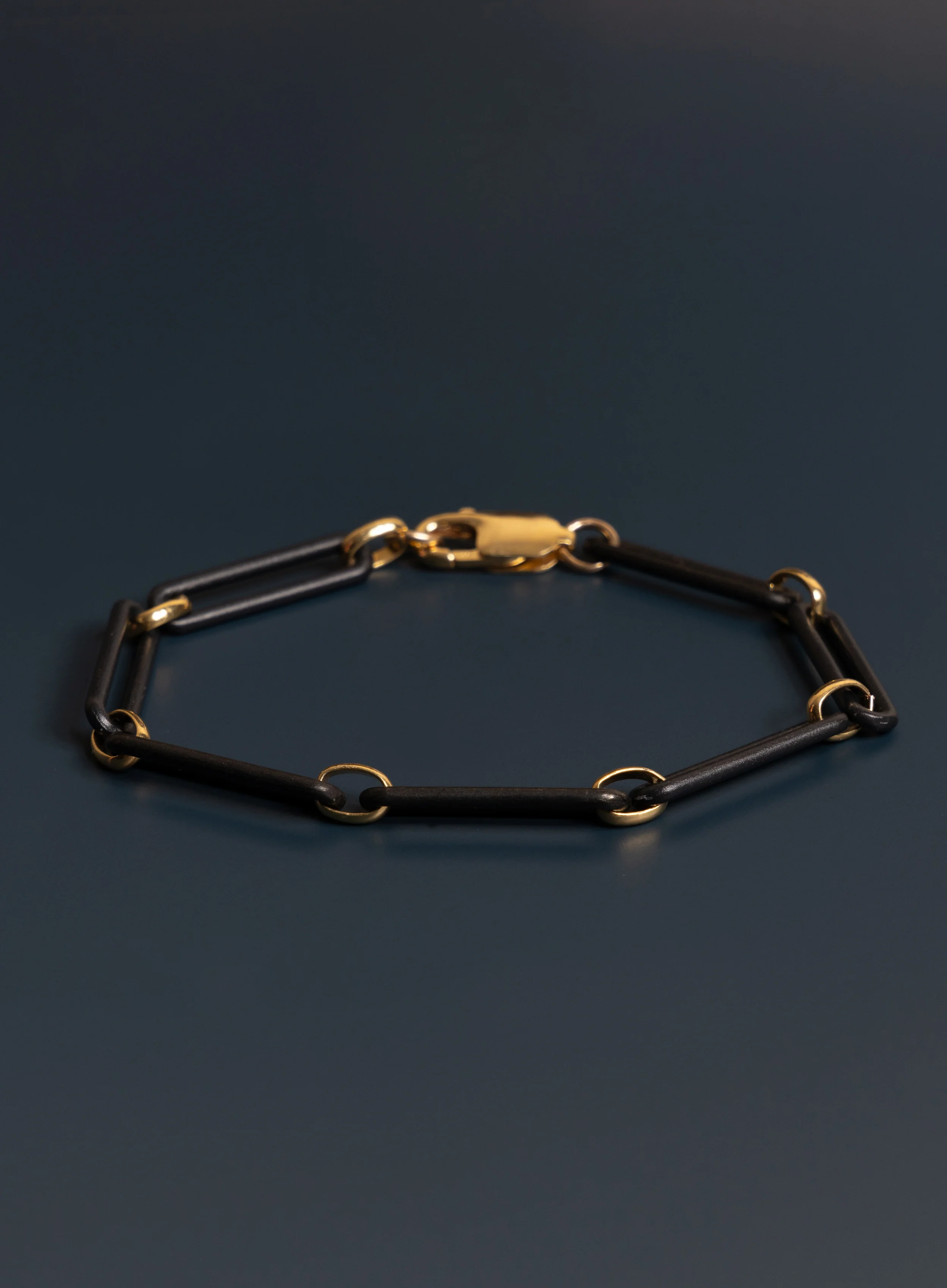 6mm Titanium and 14k Gold Filled Elongated Cable Black and Gold Men's Bracelet - Image 2