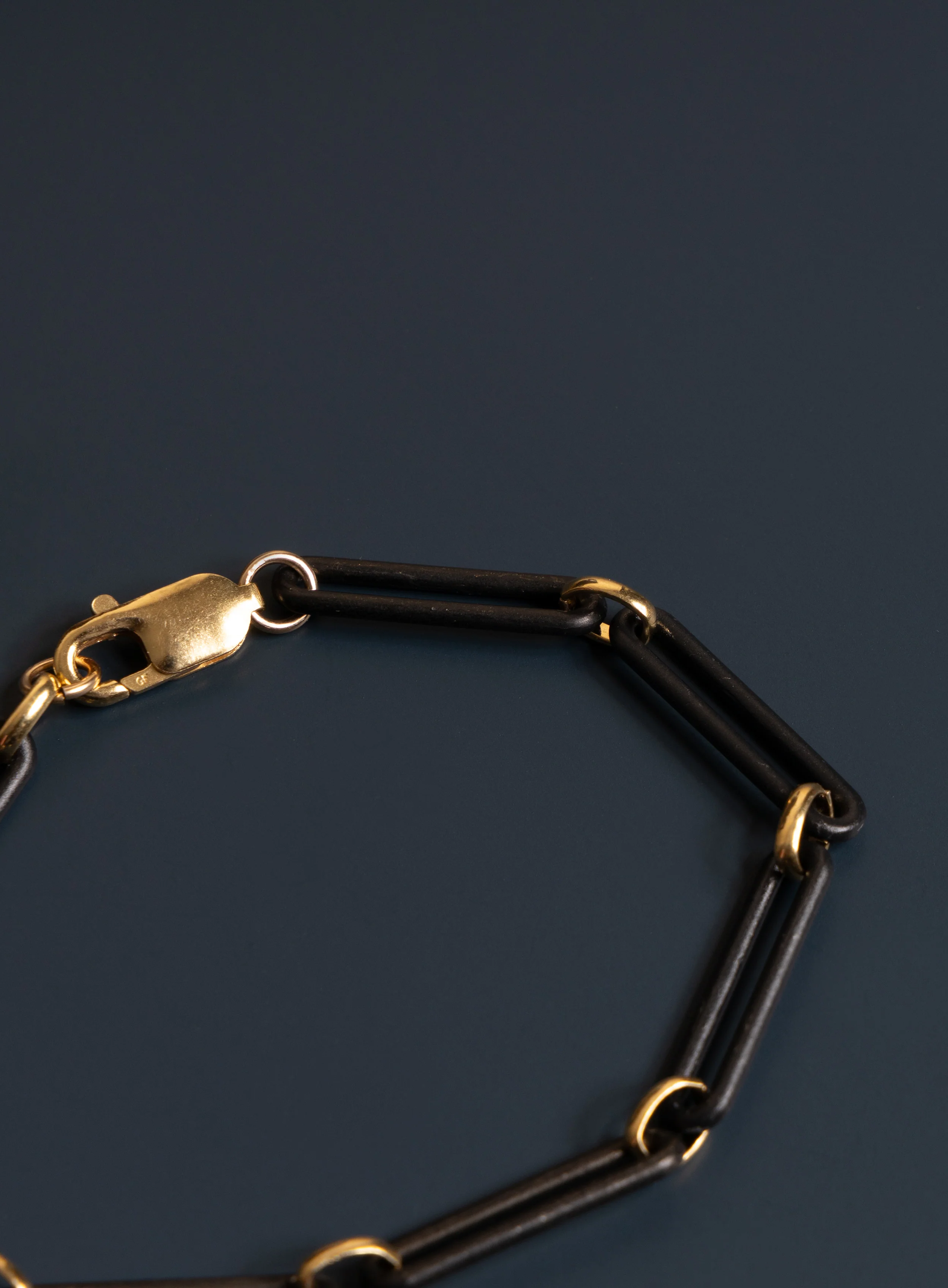 6mm Titanium and 14k Gold Filled Elongated Cable Black and Gold Men's Bracelet - Image 9