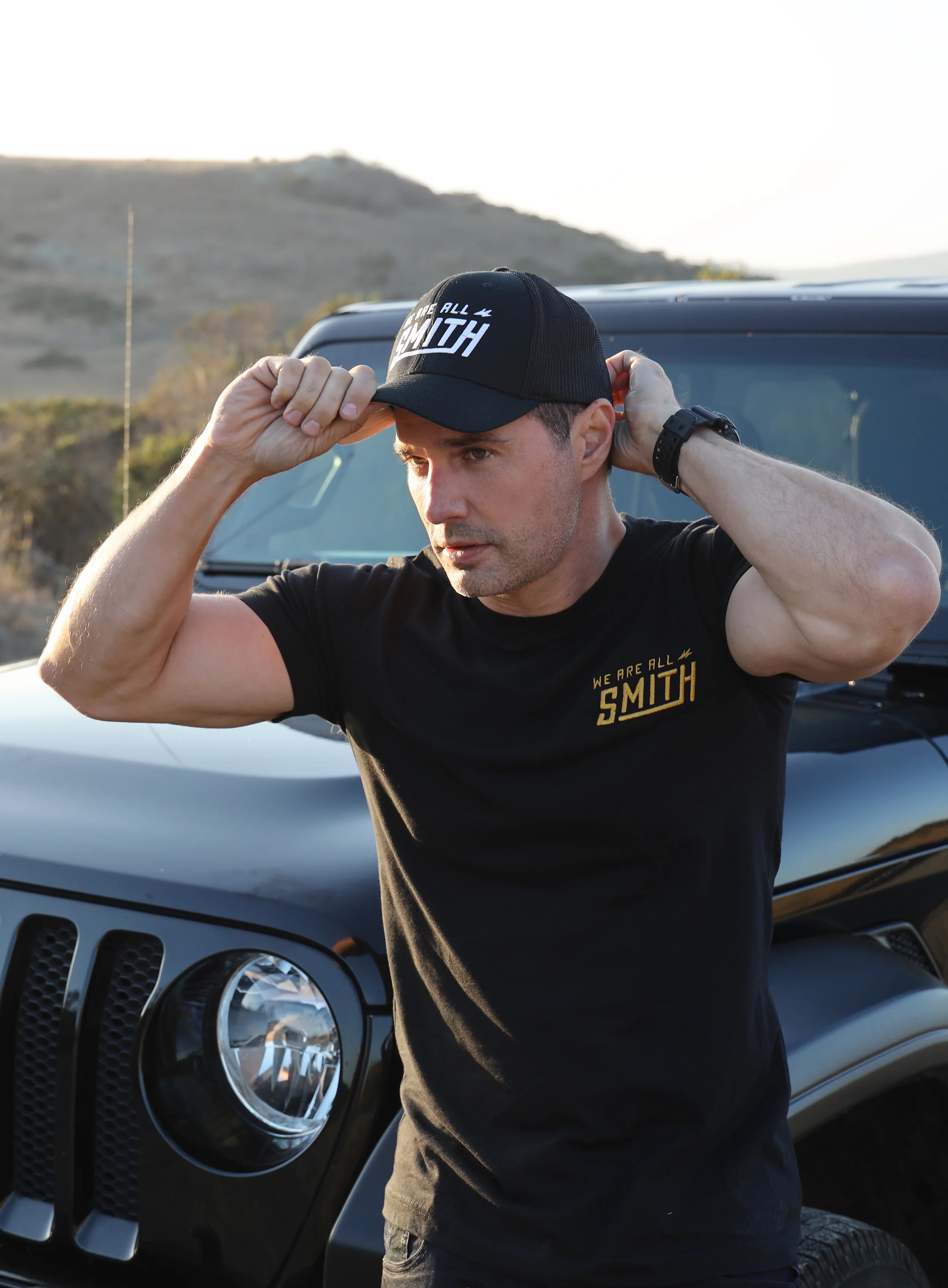 Closed-back black We Are All Smith trucker cap - Image 7