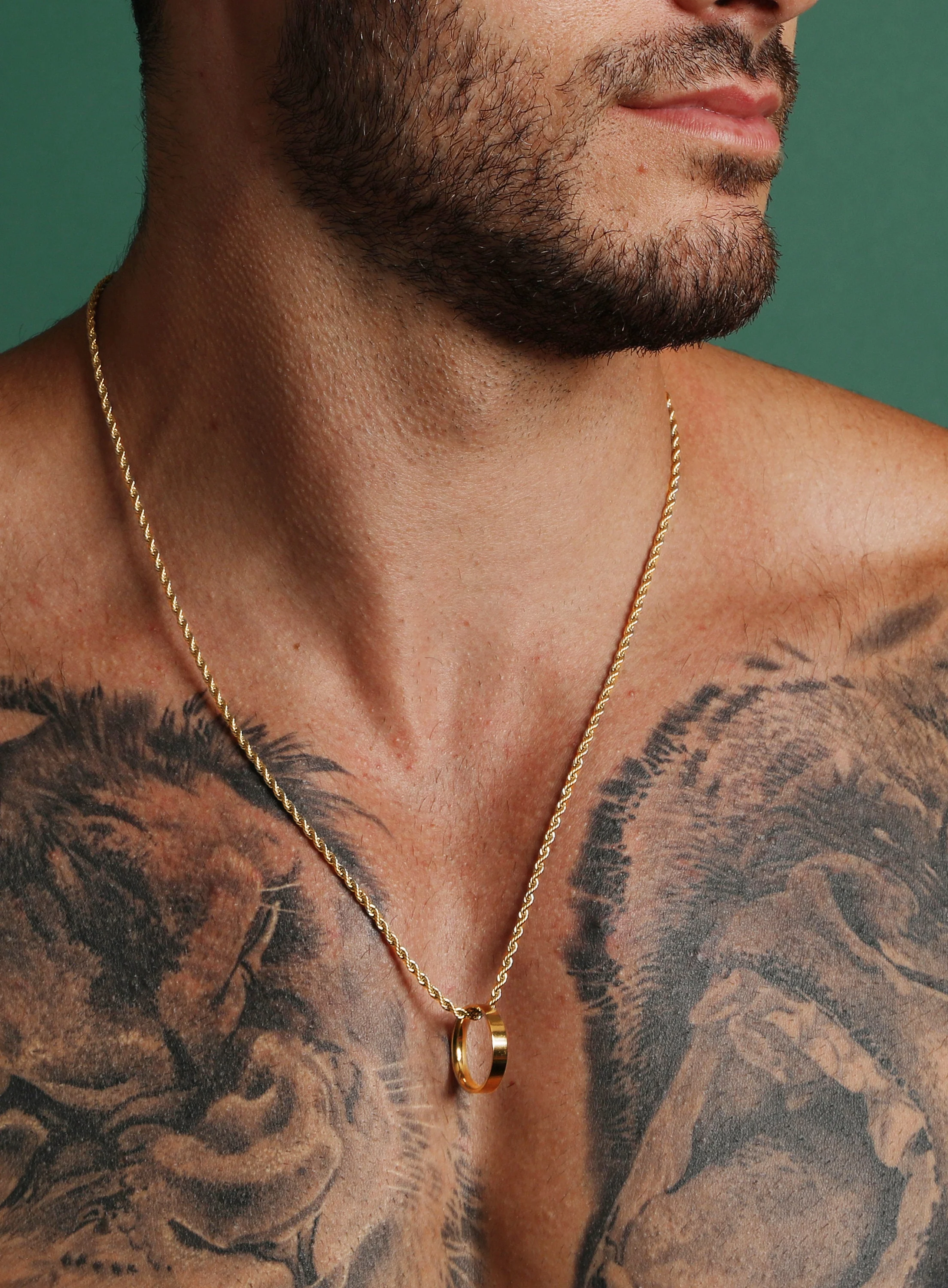 Gold Ring Necklace on rope style chain.