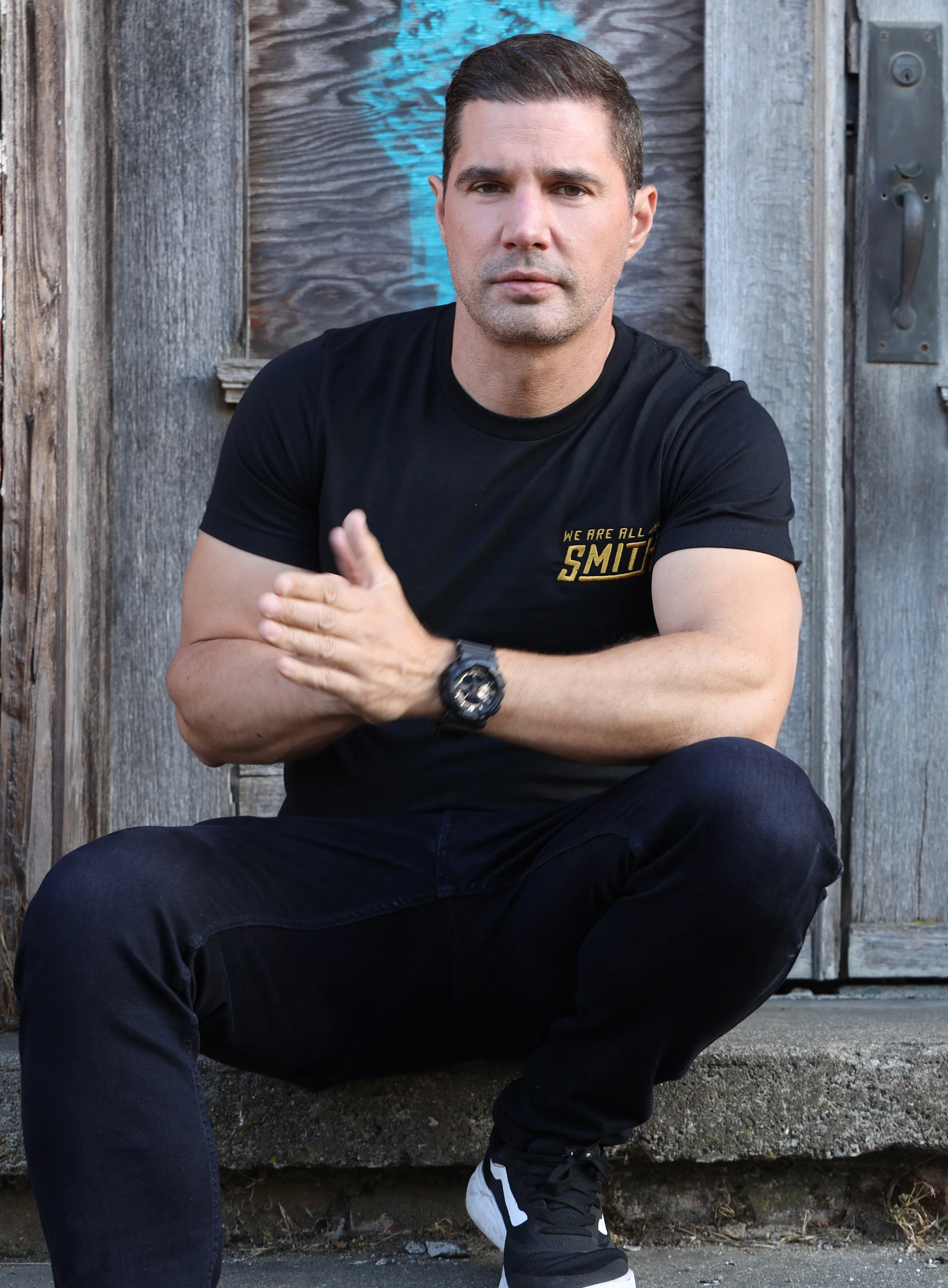Gold We Are All Smith Embroidered Logo Black Unisex t-shirt - Image 7