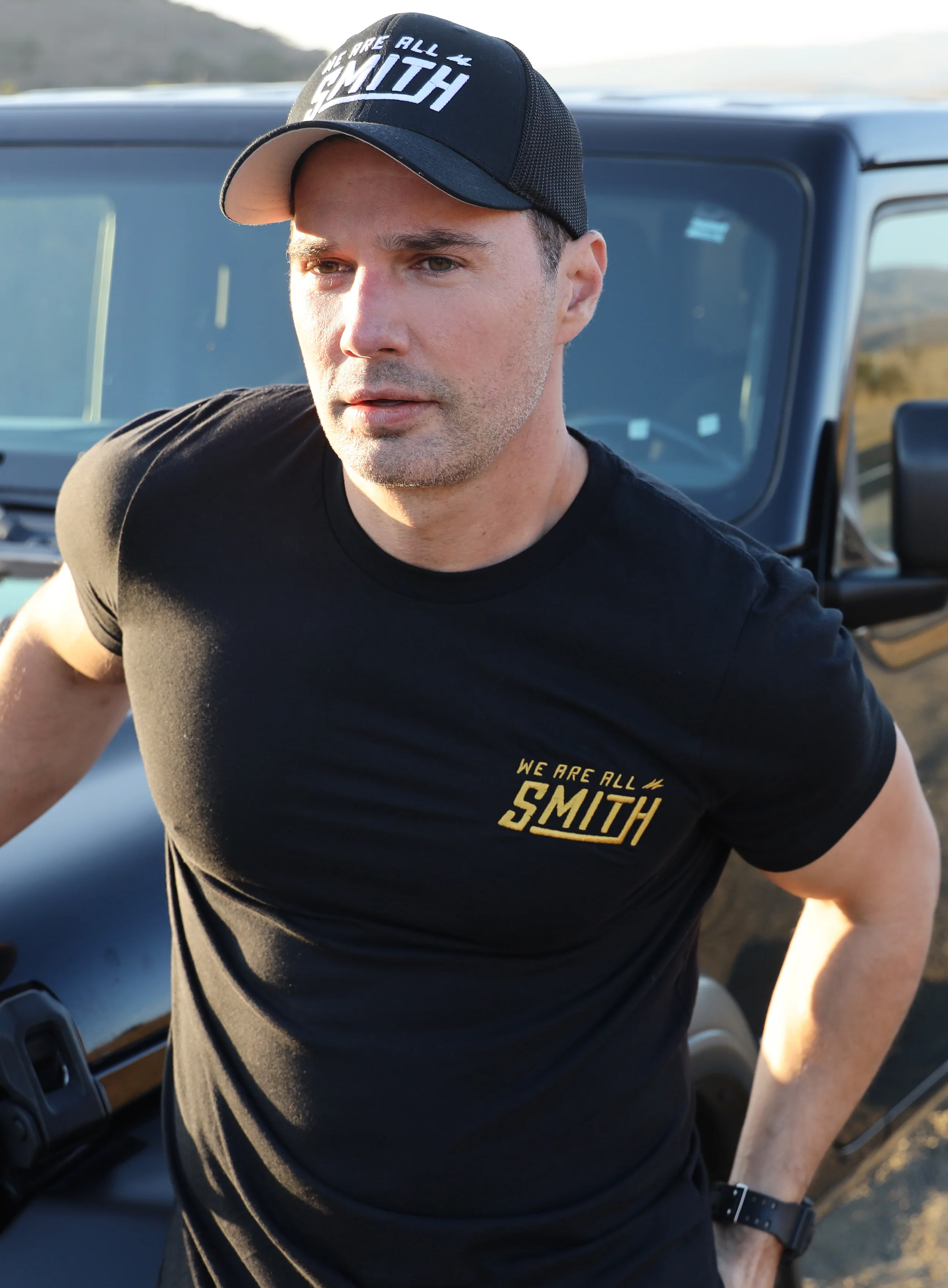 Gold We Are All Smith Embroidered Logo Black Unisex t-shirt - Image 9